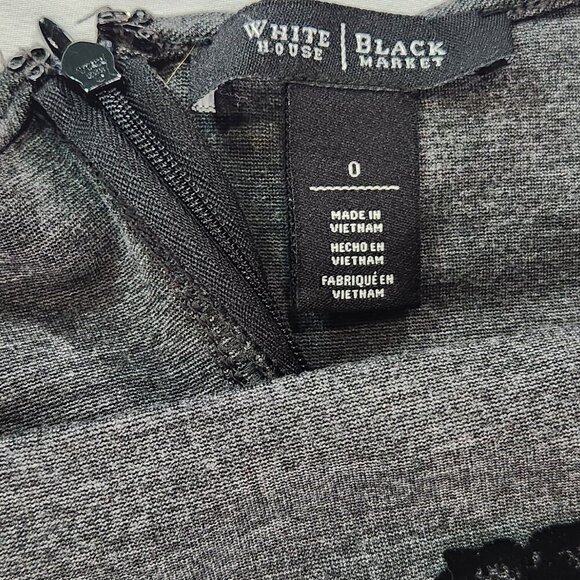 White House Black Market gray blouse with black roses. Size 0
Lot I - Picture 2 of 5